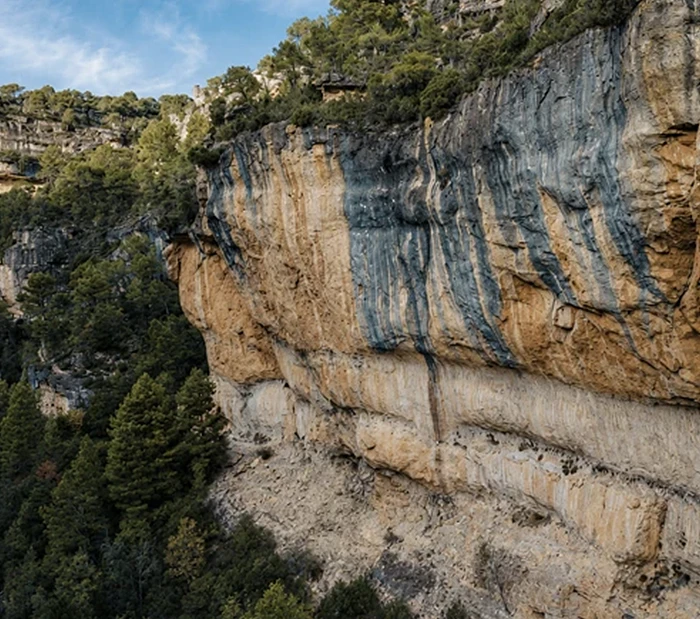 Reading the Wall — studying reference photos of the route