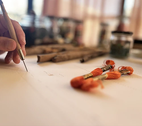 The First Marks — the first needle punctures in the fabric